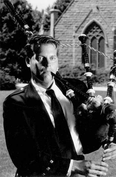 Colorado bagpiper at Evans Chapel, photo by Bill Freeman at Insight (303)670-5566