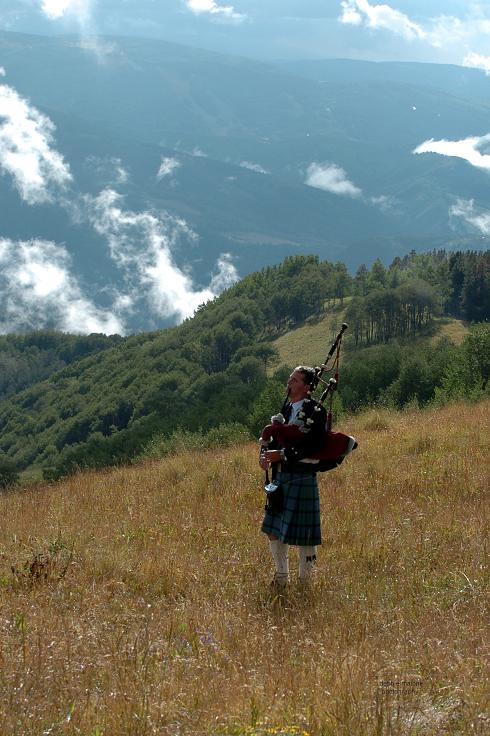 Colorado bagpiper playing ancient tunes on outlawed pipes, photo by Debbie Malone