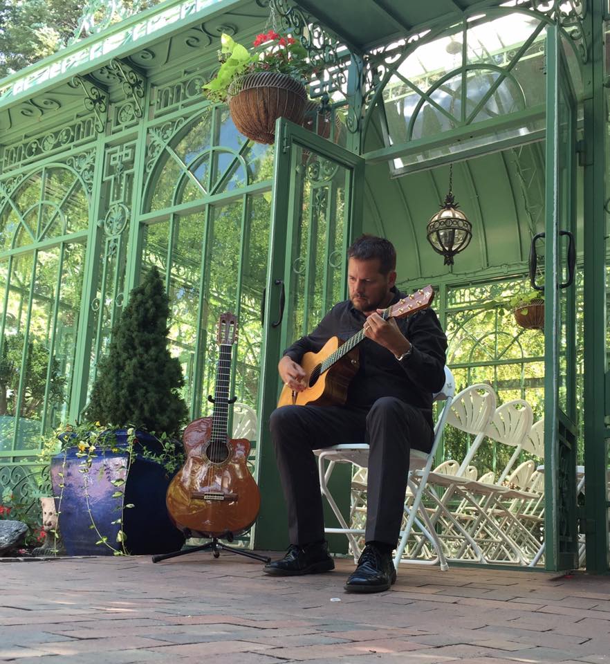 Colorado guitarist at Vail Wedding Deck, Vail Colorado.